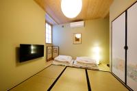 Habitación de estilo japonés con baño compartido