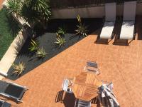 Casa Silencio, Villa with terrace, garden and large pool area - Chambres d'hôtes Corralejo