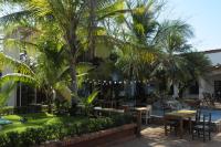 Tropical Gardens Suites and Apartments - Bed and Breakfast Coco, Sardinal