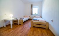 Small Twin Room with Shared Toilet