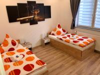 Camera Standard Doppia con Letti Singoli con Bagno in Comune