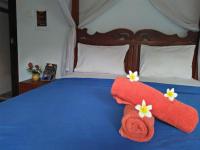 Kamer met Queensize Bed en Uitzicht op de Tuin