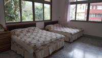 Habitación Cuádruple - vistas al jardín