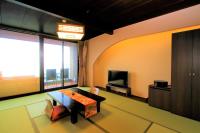 Chambre Triple de Style Japonais avec Baignoire en Plein Air