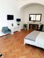 Kamer met Queensize Bed en Uitzicht op de Tuin