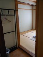 Camera Doppia in Stile Giapponese con Letti Singoli