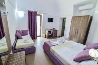 Camera Tripla con Vista Giardino