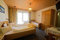 Dreibettzimmer mit Balkon