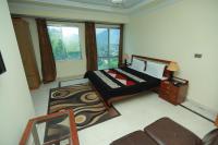 Chambre Lit Queen-Size Deluxe