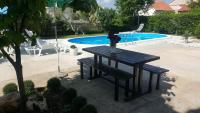 Camera Familiare con Vista Giardino
