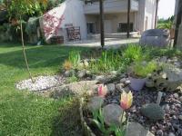 Guesthouse with Garden - Ferienwohnung