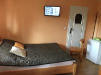 Vierpersoonskamer met Uitzicht op de Tuin.