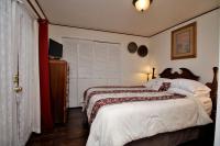 Zimmer mit Queensize-Bett und Terrasse
