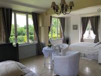 Dreibettzimmer mit Gartenblick