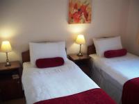 Tweepersoonskamer met 2 Aparte Bedden
