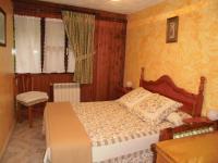 Zimmer mit Queensize-Bett