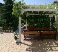 Camera Familiare con Vista Giardino