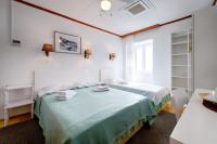Dreibettzimmer mit Meerblick
