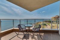 One-Bedroom Apartment with Balcony and Sea View