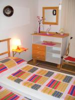 Two-Bedroom Apartment with Balcony and Garden View