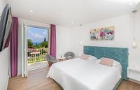 Camera Deluxe Matrimoniale/Doppia con Letti Singoli con Balcone