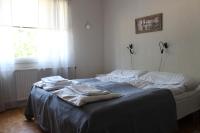 Tweepersoonskamer met 2 Aparte Bedden en Gedeelde Badkamer