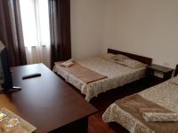 Dreibettzimmer mit eigenem Bad