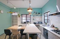 Tweepersoonskamer met Uitzicht op de Tuin en een Gedeelde Badkamer