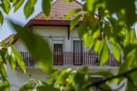 Tweepersoonskamer met 2 aparte bedden en Uitzicht op de Tuin