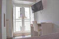Zimmer mit Queensize-Bett