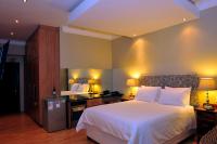 Suite Deluxe con cama grande y vistas al mar