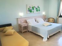 Camera Quadrupla con Vista Giardino 