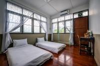 Camera Standard Doppia con Letti Singoli con Bagno in Comune