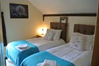Tweepersoonskamer met 2 Aparte Bedden