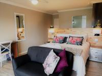 Kamer met Queensize Bed en Uitzicht op de Tuin