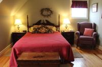 Zimmer mit Queensize-Bett und Gartenblick