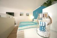 Ferienwohnung Strandallee 200 - Chambres d’hôtes