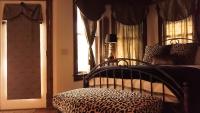 Suite Deluxe con cama extragrande y bañera de hidromasaje