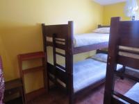 Single Bed in Dormitory Room