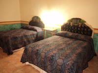 Dvoulůžkový pokoj se 2 manželskými postelemi 