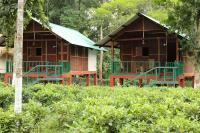 Habitación con cama extragrande y vistas al jardín 