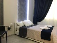 Camera Deluxe (2 Adulti + 1 Bambino)