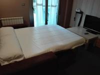 One-Bedroom Apartment (2 Adults + 2 Children)