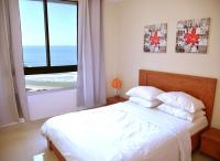Kamer met Queensize Bed en Uitzicht op Zee