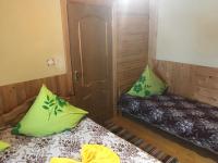 Chambre Deluxe (2 Adultes + 1 Enfant)
