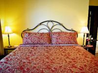Kamer met Kingsize Bed en Uitzicht op de Tuin