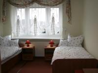 Tweepersoonskamer met 2 Aparte Bedden