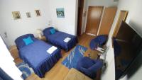 Tweepersoonskamer met 2 Aparte Bedden en Badkamer