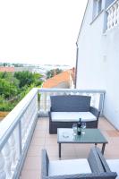 One-Bedroom Apartment with Balcony and Sea View