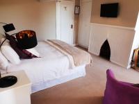 Zimmer mit Kingsize-Bett